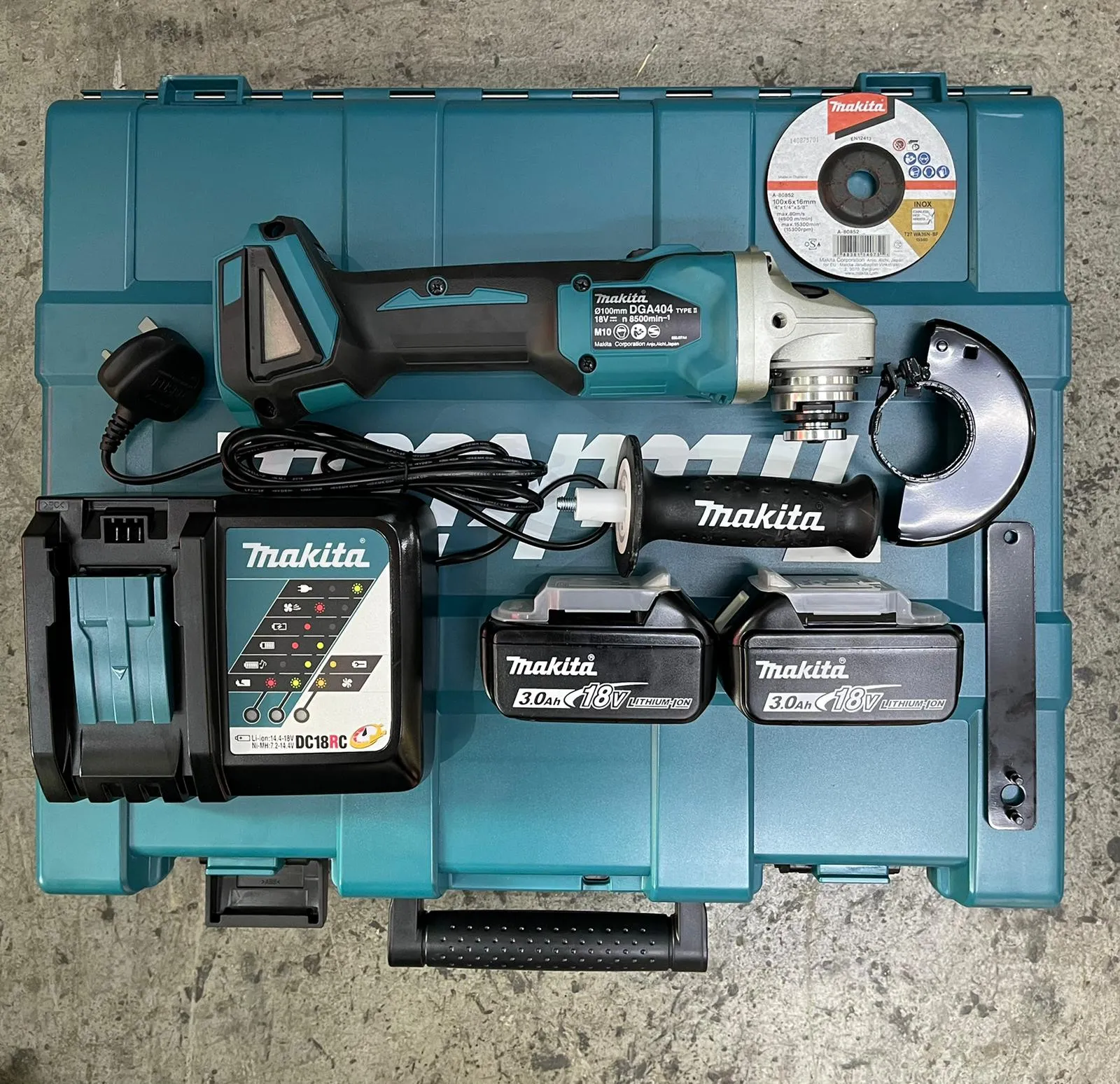 MAKITA 4" 18V 5.0AH CORDLESS ANGLE GRINDER | Model : DGA 404 RTE   2 PORT CHARGER